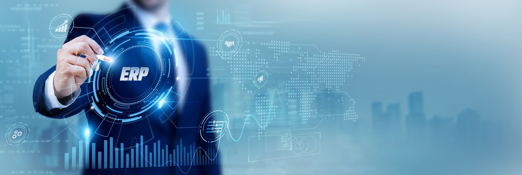 Business manager using a pen while analyzing data ERP Enterprise Resource Planning Business manager using a pen while analyzing data ERP Enterprise Resource Planning